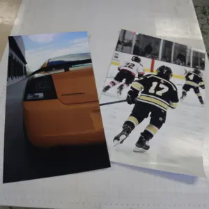 Large-format custom poster printing on a roll printer at Grafix Media in Calgary